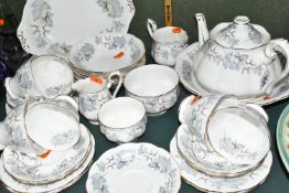 A TWENTY FIVE PIECE ROYAL ALBERT 'SILVER MAPLE' TEA SET AND DINNERWARE, comprising a teapot, a cream