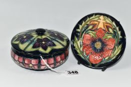 TWO PIECES OF MOORCROFT POTTERY, comprising a Violet pattern covered bowl, tube lined with
