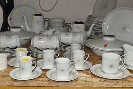 A ROYAL DOULTON 'MORNING STAR' PATTERN DINNER SET, comprising two covered tureens, twelve dinner