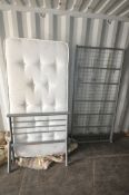 AN UNBRANDED SINGLE MATTRESS, with tubular metal bedstead (condition report: general signs of