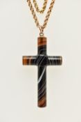 A LATE VICTORIAN CARVED AGATE CROSS PENDANT WITH BELCHER CHAIN, large carved and polished brown