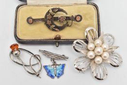 FOUR BROOCHES, to include a late Victorian silver brooch designed as a bar brooch with central