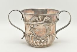 A GEORGE II SILVER DOUBLE HANDLED PORRINGER, stop reeded design with embossed cherub engraved