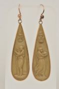 A PAIR OF YELLOW METAL LAVA CAMEO DROP EARRINGS, of a pear drop shape, each depicting a female