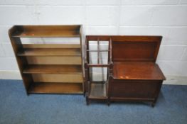 A 20TH CENTURY OAK HALL SETTLE, with a hinged seat and a shaped umbrella/stick stand, with drip