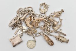 A WHITE METAL CHARM BRACELET, curb link bracelet fitted with a heart padlock clasp, stamped '