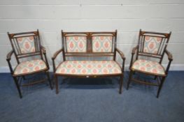 AN EDWARDIAN MAHOGANY AND INLAID THREE PIECE PARLOUR SUITE, comprising a two seater sofa, with