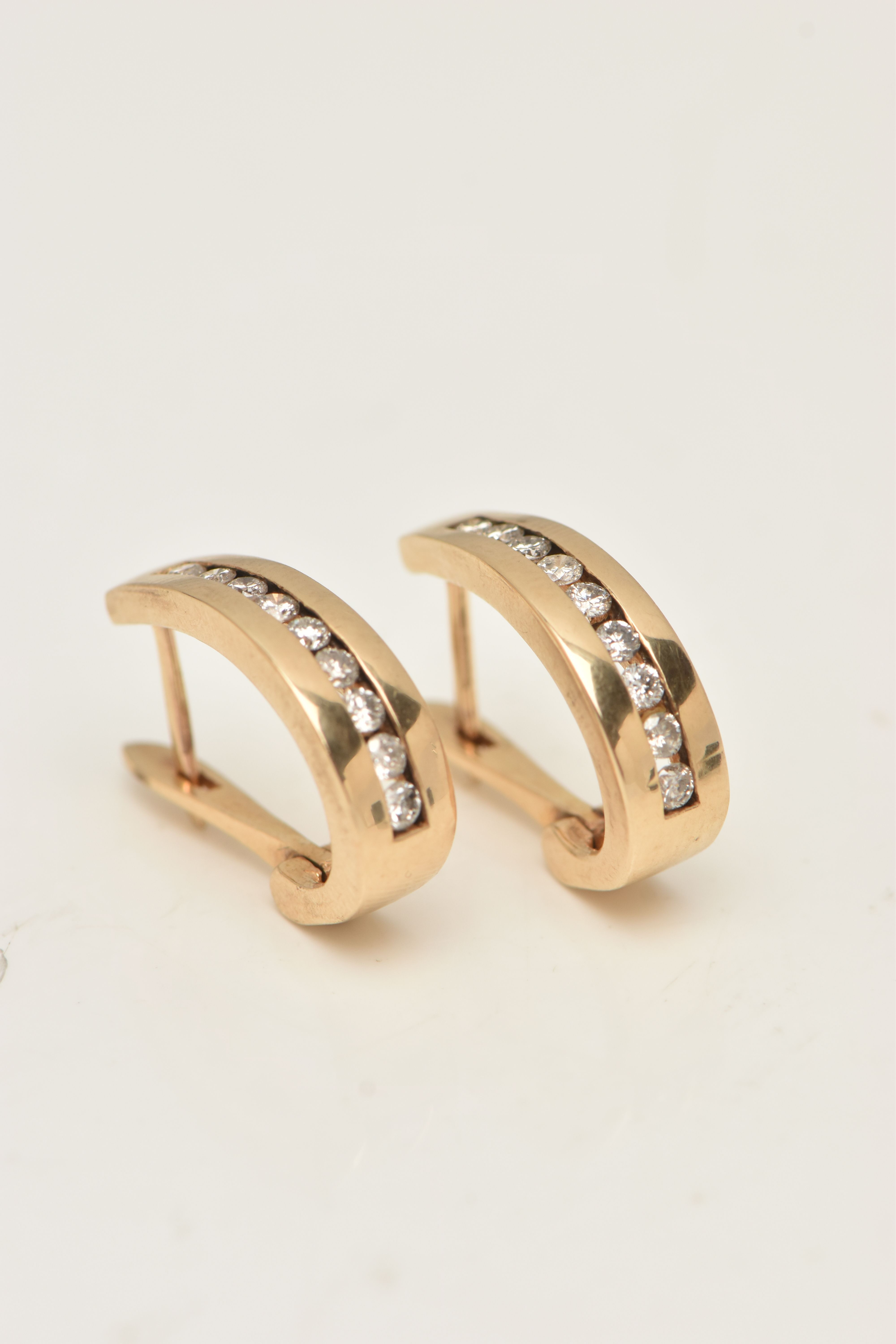 A PAIR OF 9CT GOLD DIAMOND HOOP EARRINGS, yellow gold half hoop, channel set with round brilliant - Image 3 of 5