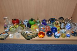 A COLLECTION OF PAPERWEIGHTS, over forty pieces to include a Caithness paperweight with blue flower,