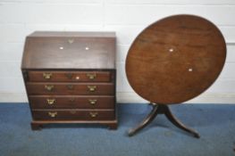 A GEORGIAN MAHOGANY BUREAU, the fall front door enclosing a fitted interior, above four drawers,