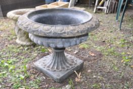 A MODERN COMPOSITE BALUSTERED GARDEN URN with a square fluted and tapered base and 64cm diameter