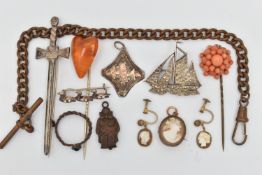 A SELECTION OF JEWELLERY, to include a heart shape amber stickpin, a marcasite boat brooch, a