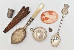 A SMALL BAG OF ITEMS, to include a silver commemorative teaspoon for Queen Elizabeth II,