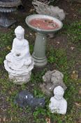 A COLLECTION OF MODERN GARDEN ORNAMENTS including an oriental figure water feature sat atop a