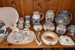 A COLLECTION OF POOLE POTTERY, twenty seven pieces to include a large Traditional Ware Carter