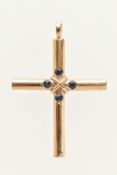 A 9CT GOLD GEM SET CROSS PENDANT, set to the centre with four circular cut blue sapphires, fitted