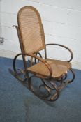 A THONET STYLE BENTWOOD ROCKING CHAIR, with bergère back and seat, width 57cm x depth 97cm x