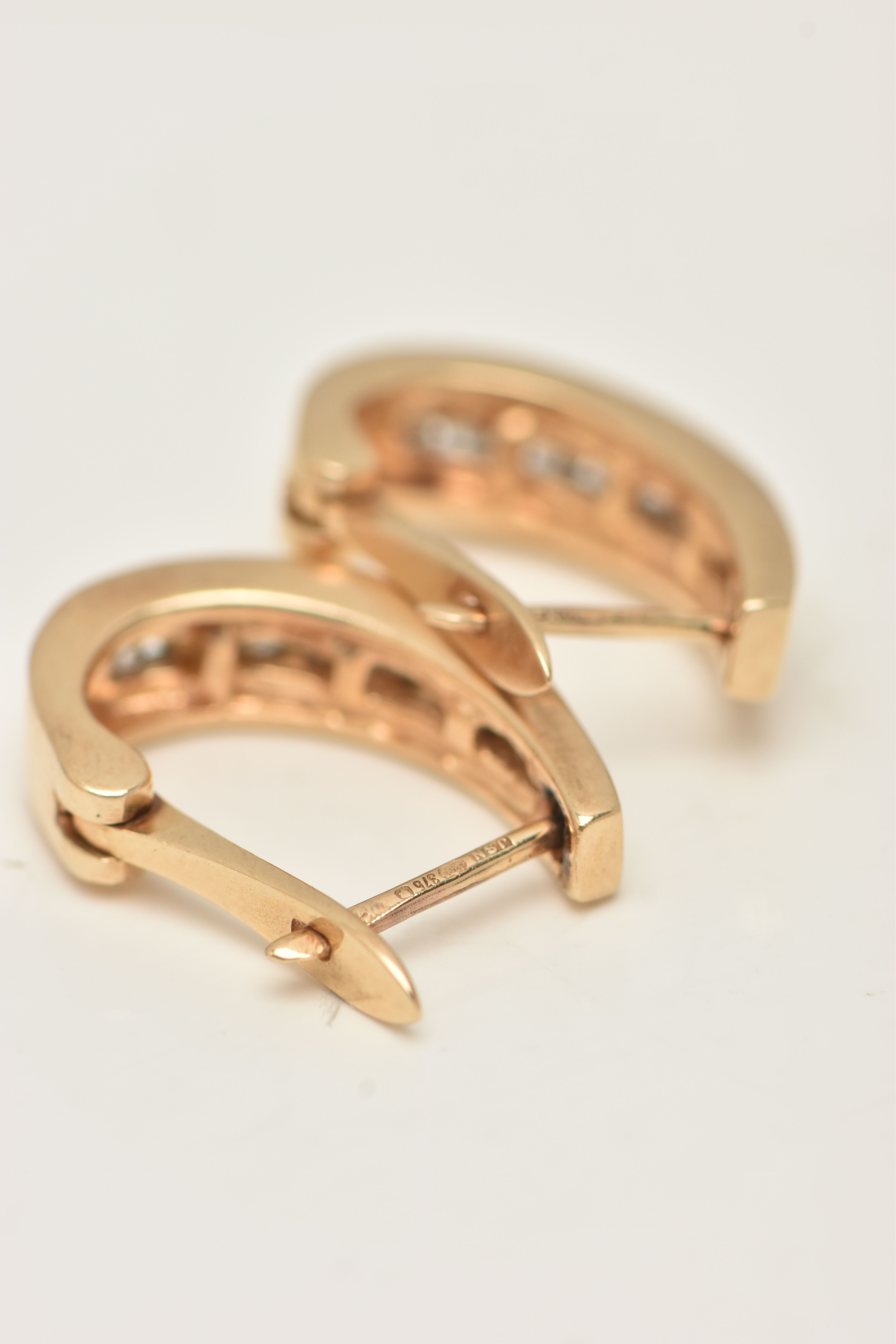 A PAIR OF 9CT GOLD DIAMOND HOOP EARRINGS, yellow gold half hoop, channel set with round brilliant - Image 5 of 5