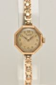 A LADIES 9CT GOLD WRISTWATCH AND A WATCH BRACELET, manual wind watch, round discolored dial