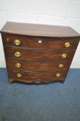 A GEORGIAN MAHOGANY BOWFRONT CHEST OF FOUR LONG DRAWERS, with brass handles and back plates, on