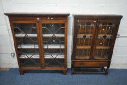 AN EARLY 20TH CENTURY MAHOGANY BOOKCASE, with double astragal glazed doors, enclosing three shelves,