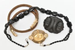 FOUR ITEMS OF MAINLY MOUNRING JEWELLERY, to include a woven hair bracelet with embossed terminals, a