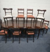 A GEORGIAN MAHOGANY OVAL DINING TABLE, that consists of two D-end tables and a central drop leaf