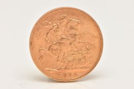 A FULL GOLD SOVEREIGN COIN, obverse depicting Edward VII, reverse with George and the Dragon,