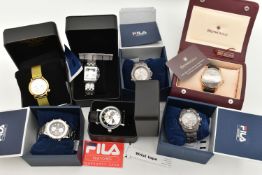 SEVEN BOXED WRISTWATCHES, to include three Fila chronograph watches, two with titanium cases, one