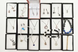 AN ASSORTMENT OF WHITE METAL JEWELLERY, to include nine necklaces, a bracelet, a necklace and