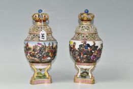 A NEAR PAIR OF LATE NINETEENTH CENTURY CAPODIMONTE POT POURRI VASES, the finials in the form of a