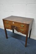 A GEORGIAN STYLE OAK LOWBOY, with three frieze drawers, and central open fretwork, on square