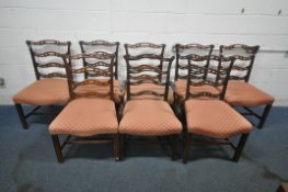 A SET OF SEVEN 19TH CENTURY MAHOGANY CHIPPENDALE LADDERBACK STYLE CHAIRS, with wide seats, along