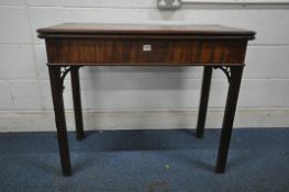A GEORGIAN MAHOGANY TEA TABLE, with a fold over top, the gate leg hiding a secret door, width 92cm x