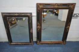 TWO EBONISED AND GILT RECTANGULAR BEVELED EDGE WALL MIRROR, largest 119cm x 87cm (condition