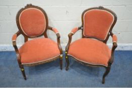 TWO OAK FRAMED FRENCH ARMCHAIRS, both with open armrests, one raised on cabriole front legs, the