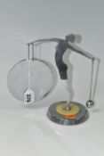 AN ART DECO CHROME FIGURAL DINNER GONG, in the form of a silhouetted female nude figure, on an early