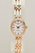 A LADIES 9CT GOLD 'ROTARY' WRISTWATCH, quartz movement, oval white dial signed 'Rotary Elite', baton