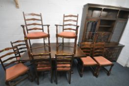A 20TH CENTURY OAK DRAW LEAF DINING TABLE, raised on trestle legs, united by a stretcher, length