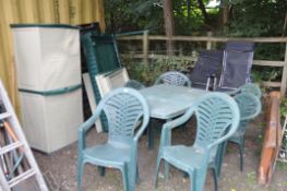 TWO PLASTIC GARDEN TOOL CUPBOARDS AND A TABLE AND SIX CHAIRS and a pair of folding chairs (one