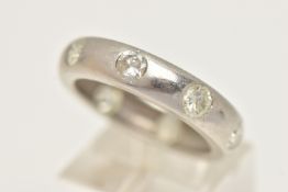A LARGE PLATINUM ETERNITY BAND RING, a platinum band ring, flush set with eight round brilliant