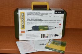 A 'PROXXON' PROFESSIONAL DRILL/GRINDER IBS/E COMPLETE WITH SIX TRIPLE SLIT STEEL COLLETS COVERING