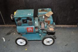 A VINTAGE SWAN GENERATOR rated at 1-2KVA with 110v and 230v outputs (engine pulls freely but hasn'