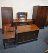 A STAG MINSTREL SEVEN PIECE BEDROOM SUITE, comprising two double door wardrobes, width 79cm x