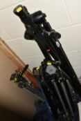 A GROUP OF FOUR ASSORTED SIZED TRIPODS AND A BAG from named manufacturers to include Eumig, Kenlock,