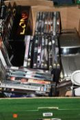 A COLLECTION OF ASSORTED JAMES BOND FILM DVDS AND OTHER MODERN BOND MEMORABILIA, to include over