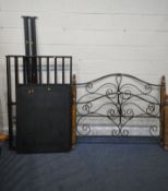 A MODERN 4FT6 WOOD AND TUBULAR METAL BEDSTEAD, with siderails, metal slats and bolts (condition