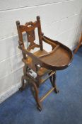 A VINTAGE CHILDS METAMORPHIC HIGH CHAIR, with a fold over tray table, width 35cm x depth 60cm x