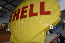 A WALL MOUNTED SHELL GARAGE SIGN, yellow plastic scallop shell logo with raised red individual