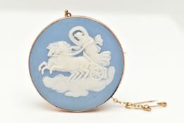 A ROSE METAL WEDGWOOD CAMEO BROOCH, of a circular form, with a blue and white cameo inlay signed